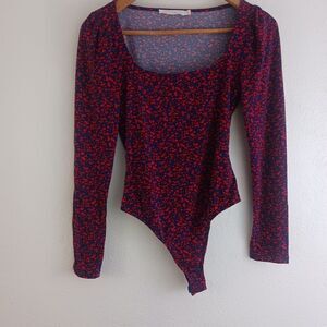 Lush long sleeve printed bodysuit size M